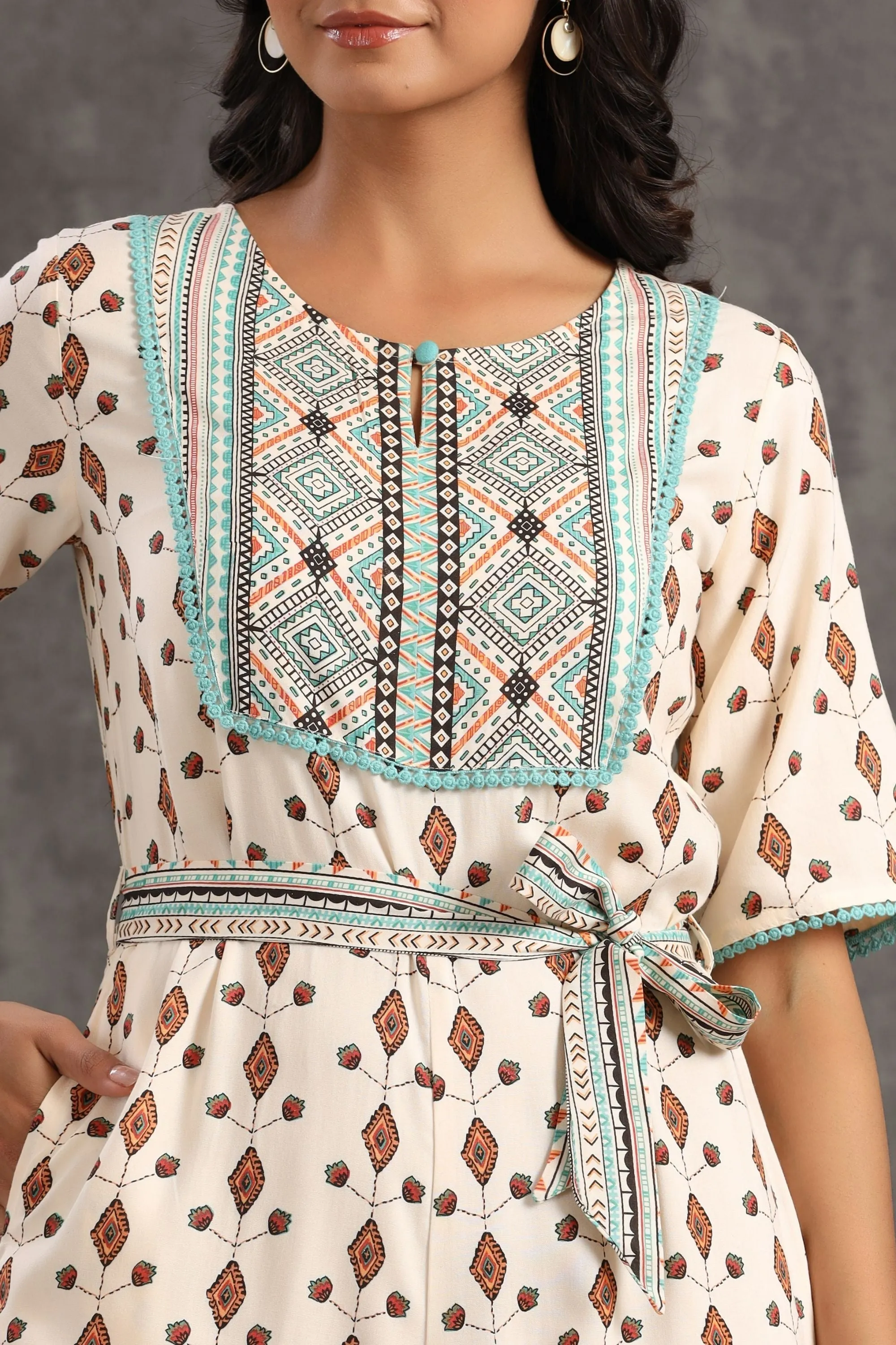 Jashvi Ivory Ethnic Motif Printed Rayon Jumpsuit With Zip